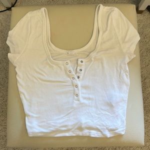 Garage button short sleeve crop top